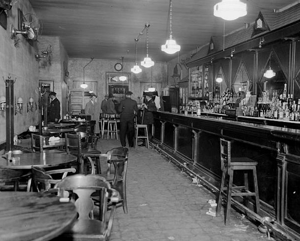 Bar Interior
Machine gunners who mowed down Dutch Schultz and three aids in this Newark bierstube turned their weapons on the Bronx racketeer as he emerged from door at far end of bar where police are congregated.

Photo from the NY Daily News
