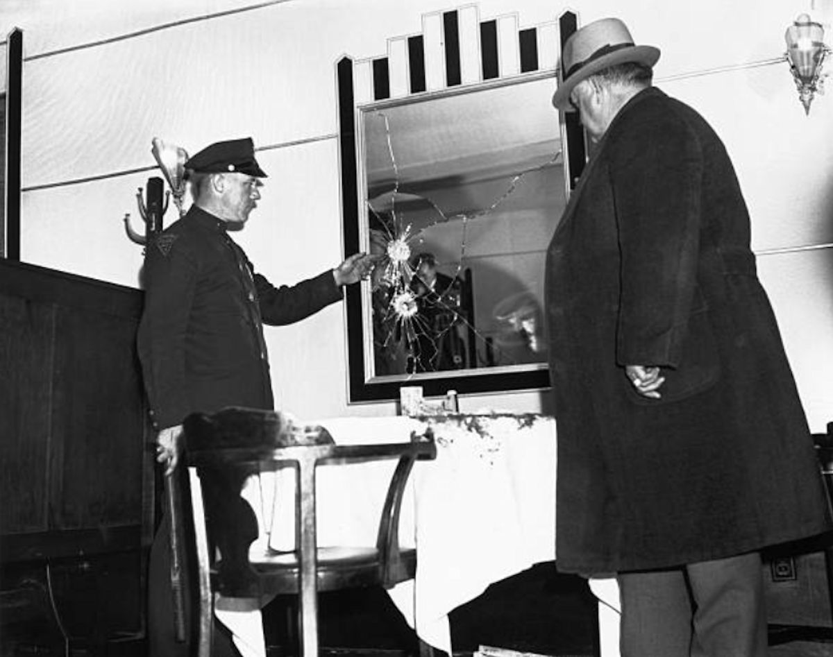Assassination Scene
Left to right, Officer Mills and Police Chief Harris at scene of Dutch Schultz shooting in Palace Bar and Grill.

Photo from Bettmann
