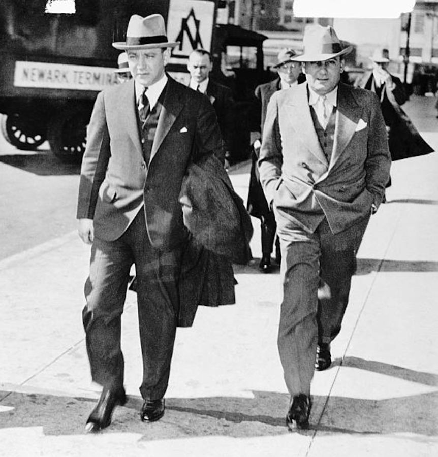 Dutch Schultz & Max Silverman
Arthur (Dutch Schultz) Flegenheimer (left) and his Bondsman, Max Silverman, leaving court a Newark, New Jersey, October 17, where the notorious gangster is held in $50,000 bail in his fight to escape extradition to New York City for trial on charge of evading the income tax laws.

Photo from Bettmann
