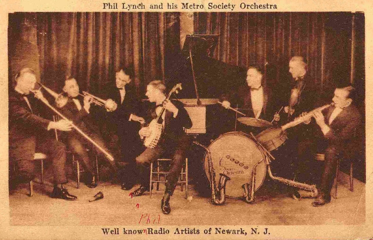 Phil Lynch and is Metro Society Orchestra
Postcard
