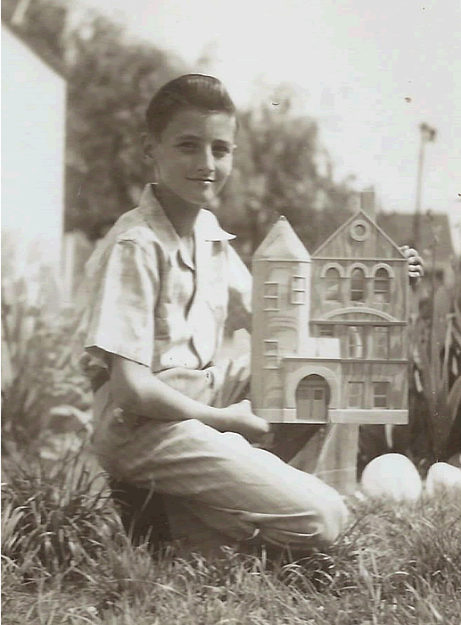 Fritts, Russell
Russell Fritts in 1946 with a model of the front of the Waverly Ave School.  This model was made by Russell and presented to Mrs. Agnes Wharton, retired Principal at her retirement dinner.

Photo from Lisa Fritts
