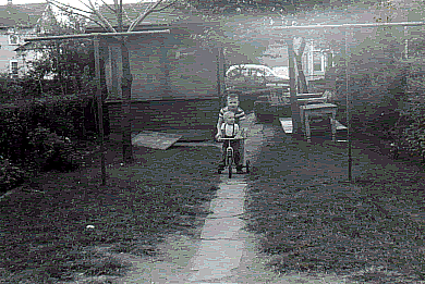 Back of 33 Hawkins Street
Don Geisheimer (standing) and Glenn Geisheimer (on bike)
