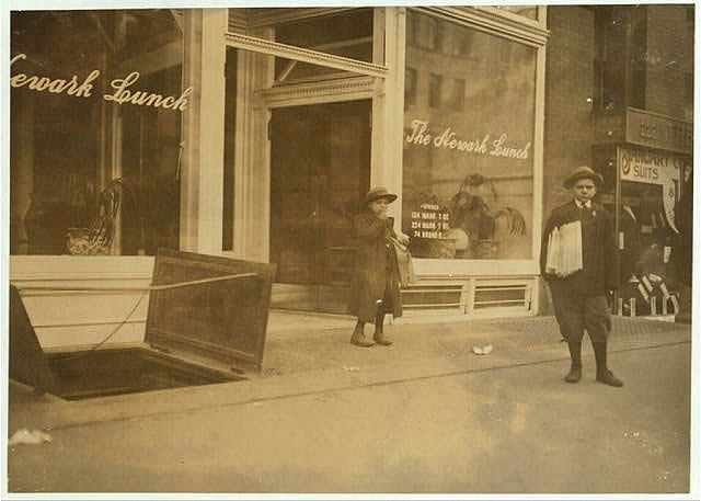 Max Schwartz (8 yrs. old) and Jacob Schwartz from 163 Howard St. Newark, N.J. Sell until 10 P.M. sometimes in front of Max Schwartz (8 yrs. old) and Jacob Schwartz of 163 Howard St. selling papers in front of 224 Market Street.
