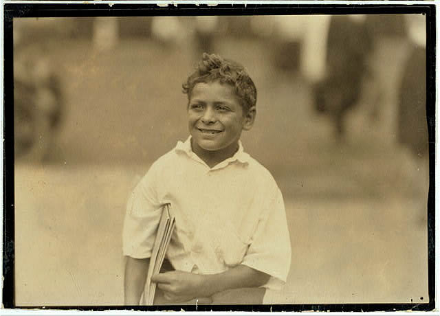 Patsy, eight year old newsboy, Newark, N.J. Says he makes fifty cents a day.
