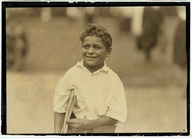 Patsy, eight year old newsboy, Newark, N.J. Says he makes fifty cents a day.
