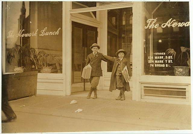 Max Schwartz (8 yrs. old) and Jacob Schwartz of 163 Howard St. selling papers in front of 224 Market Street.
