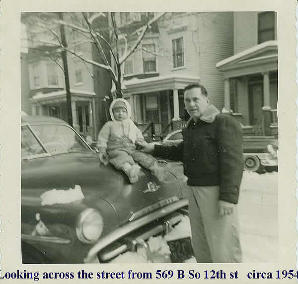 Reissner, Henry with Anthony Scardaville(on car)
